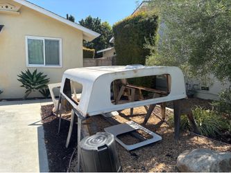 Truck camper shell cover