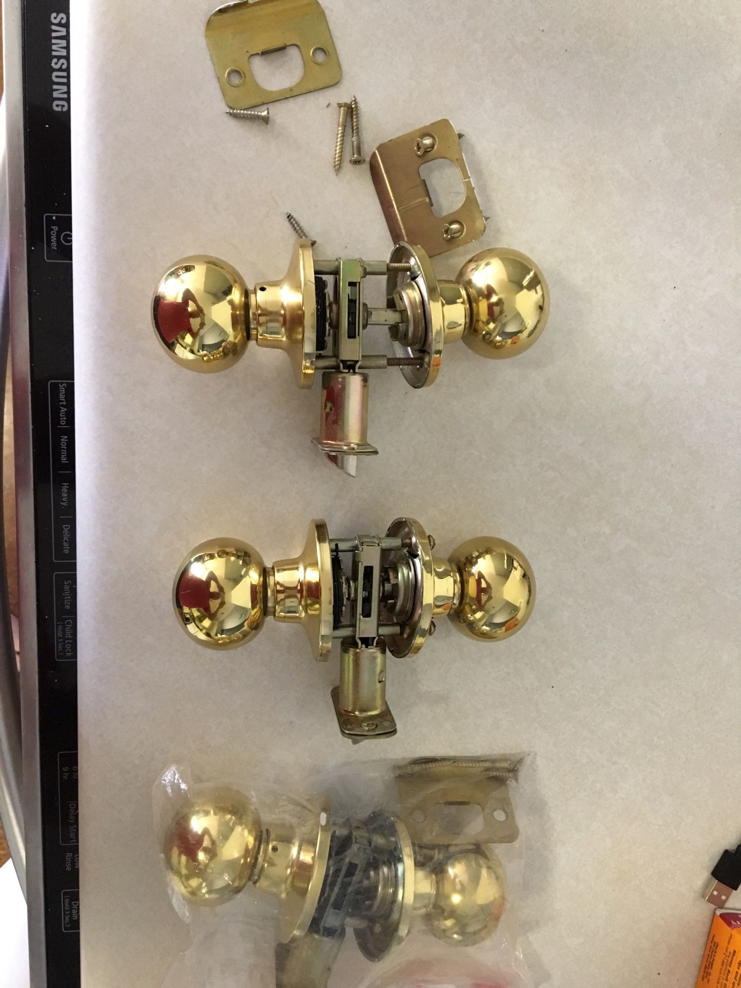 3 brass door knobs for hallway or closet