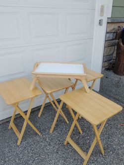 4-Piece Folding Tables and wooden folding breakfast bed tray with a smooth white top and cutout carrying handles.