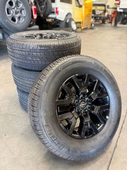 26’ 17” Nissan Frontier wheels & tires (6x4.5)