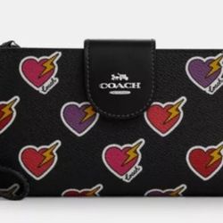 Coach Phone Wallet with Heart Bolt print NWT
