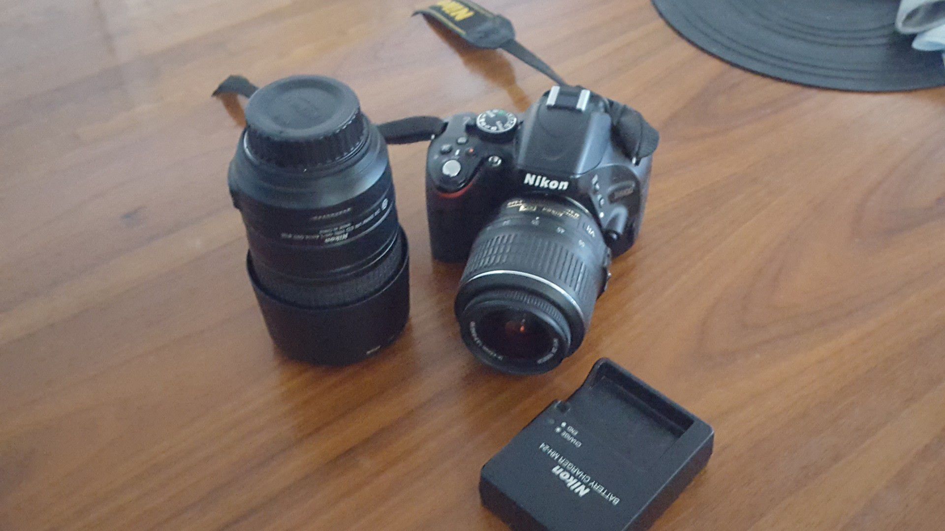 Nikon D5100 and lense. Also an additional lense and charger. I believe are nonfunctional?