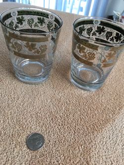 Gold pair of table glasses , antique and shick