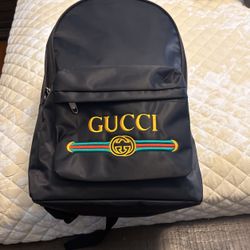 Black, Gold, Red And Green Backpack 