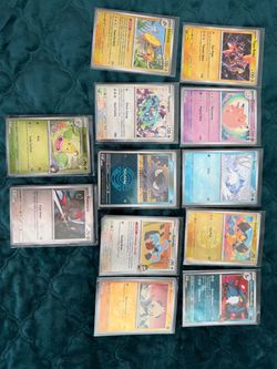 Pokémon TCG Card Lot – 14 Cards in Sleeves
