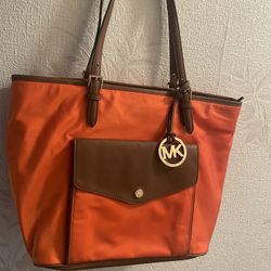 New Michael, Kors, Purse, Orange And Brown With The Light Tan Mk Symbols Inside Perfect Condition