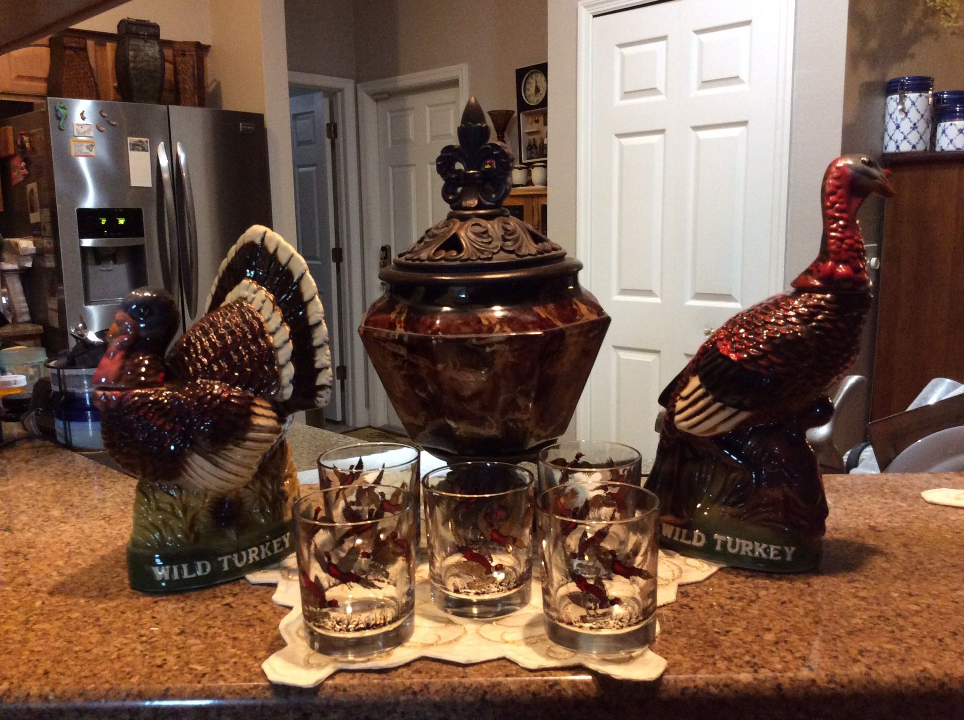 Austin Nichols Limited Edition (RARE) Wild Turkey decanters, 5 Wild Turkey glasses and vase with lid.