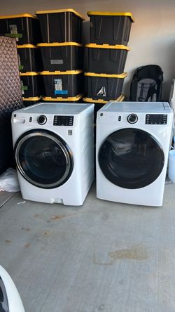 GE front loader washer and dryer.