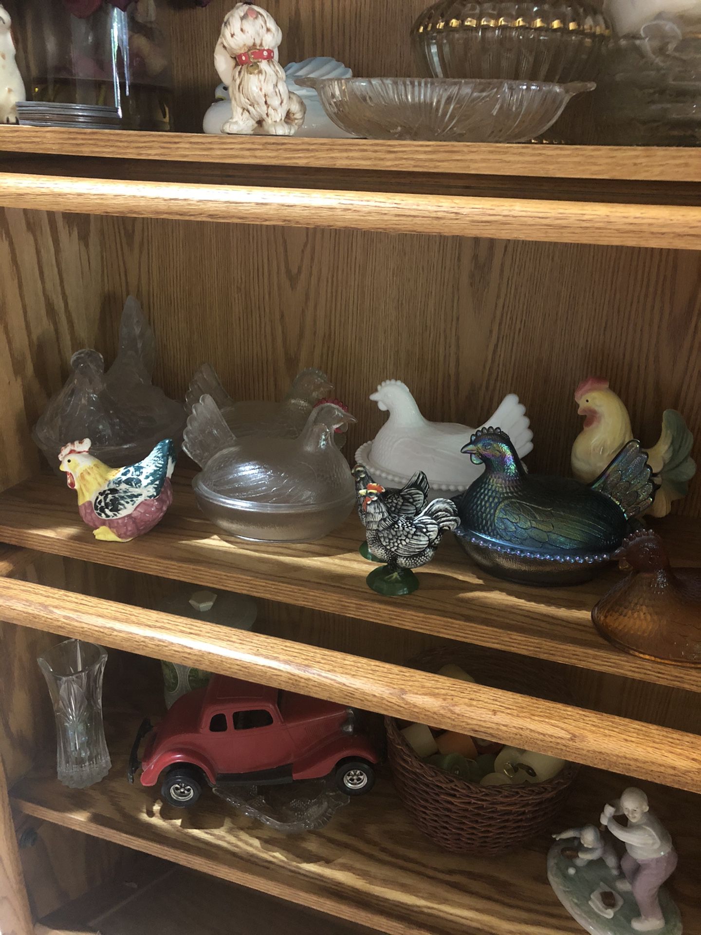 Collection of glass and ceramic chickens