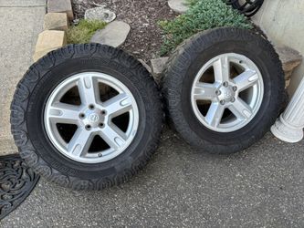 Set of 2 Dodge nitro Cherokee xj 5x4.5 rims 17” 5 lug rims in very good condition , tires worn $150  One needs a valve stem 