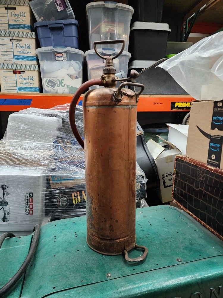 Antique Fire extinguisher salad copper.