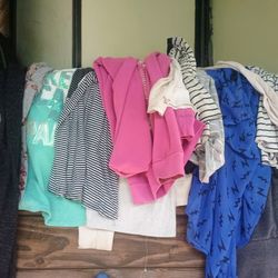 Lot of 14 women's size sm/med. shirts
