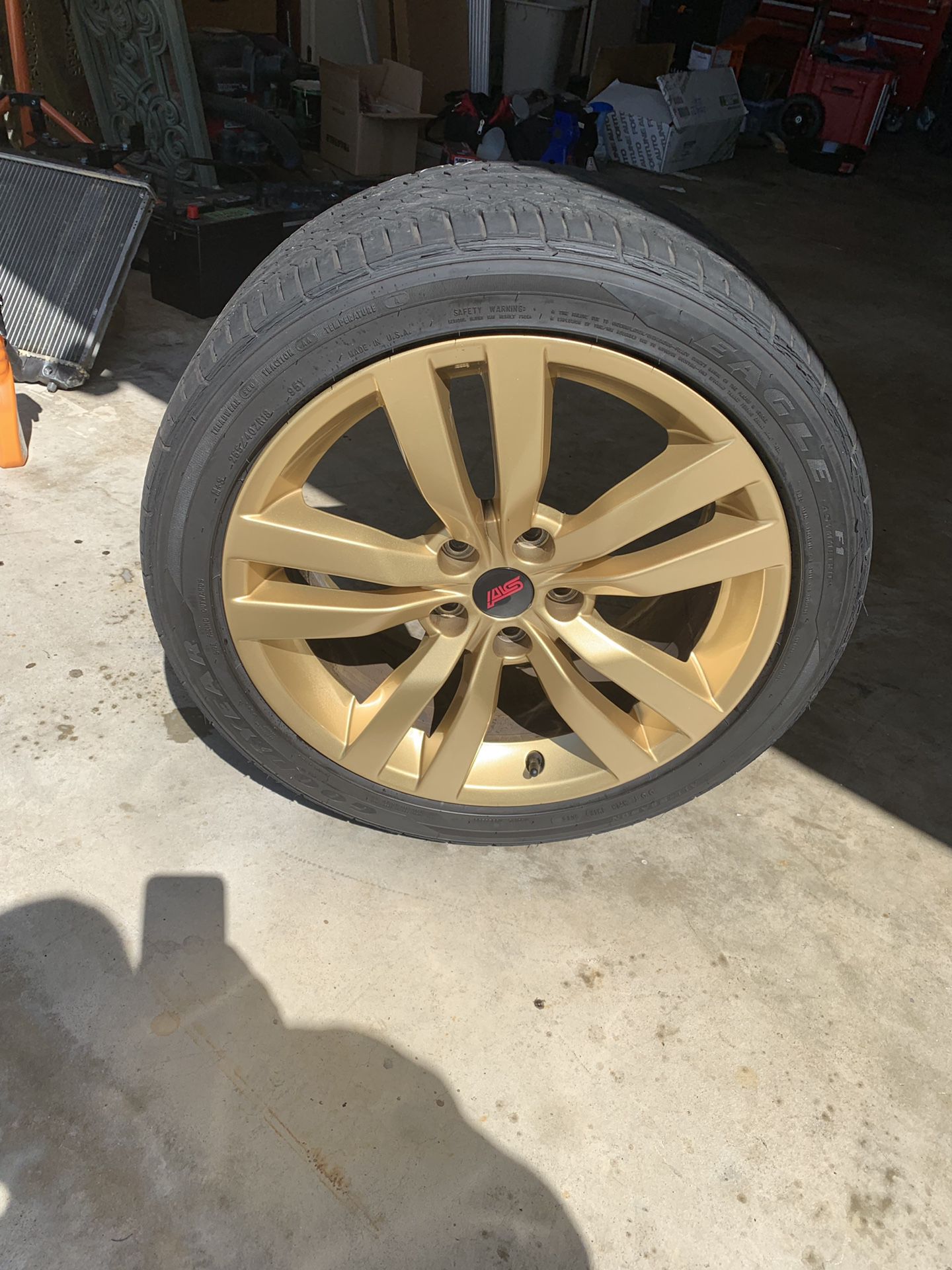 2013 STI rims 18 x 8.5 with good tires. Goodyear F1 a/s tires. Powder coated gold by WRS in Santa Ana. 800 obo