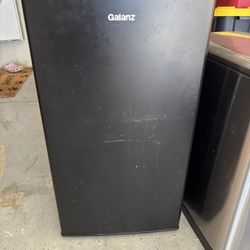 Small Refrigerator And trashcan
