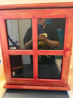 16 “ x 5 1/4 “ Red stained cabinet.