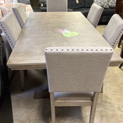 Brand new table and six chairs $1500