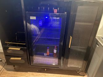 Bar with mini refrigerator included