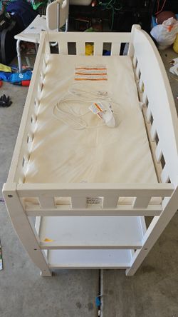 Baby changing table and owlet camera