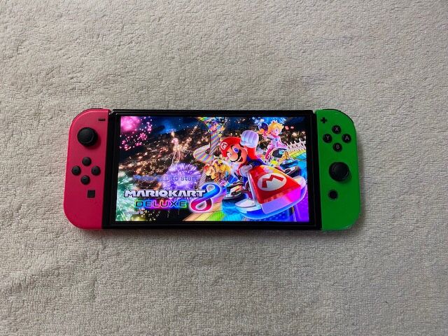 SWITCH OLED with 125 SWITCH GAMES and 512GB
