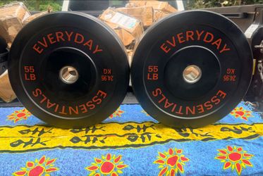 PAIR  OF  55 LB.  NEW  BUMPER  PLATES