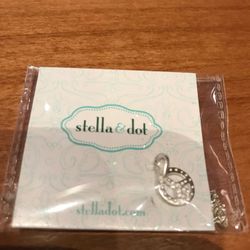 Stella & Dot silver necklace and peace charm