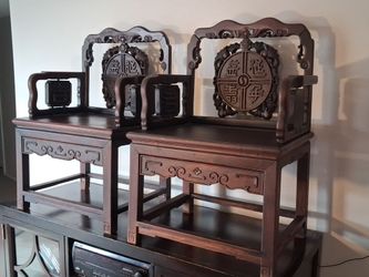 This is a pair of highly significant Chinese "Taishi" (Scholar’s/Throne) chairs crafted from Zitan Wood