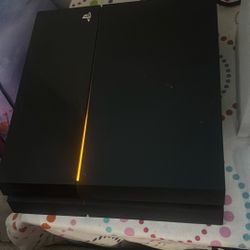 PS4 And Controller And Games