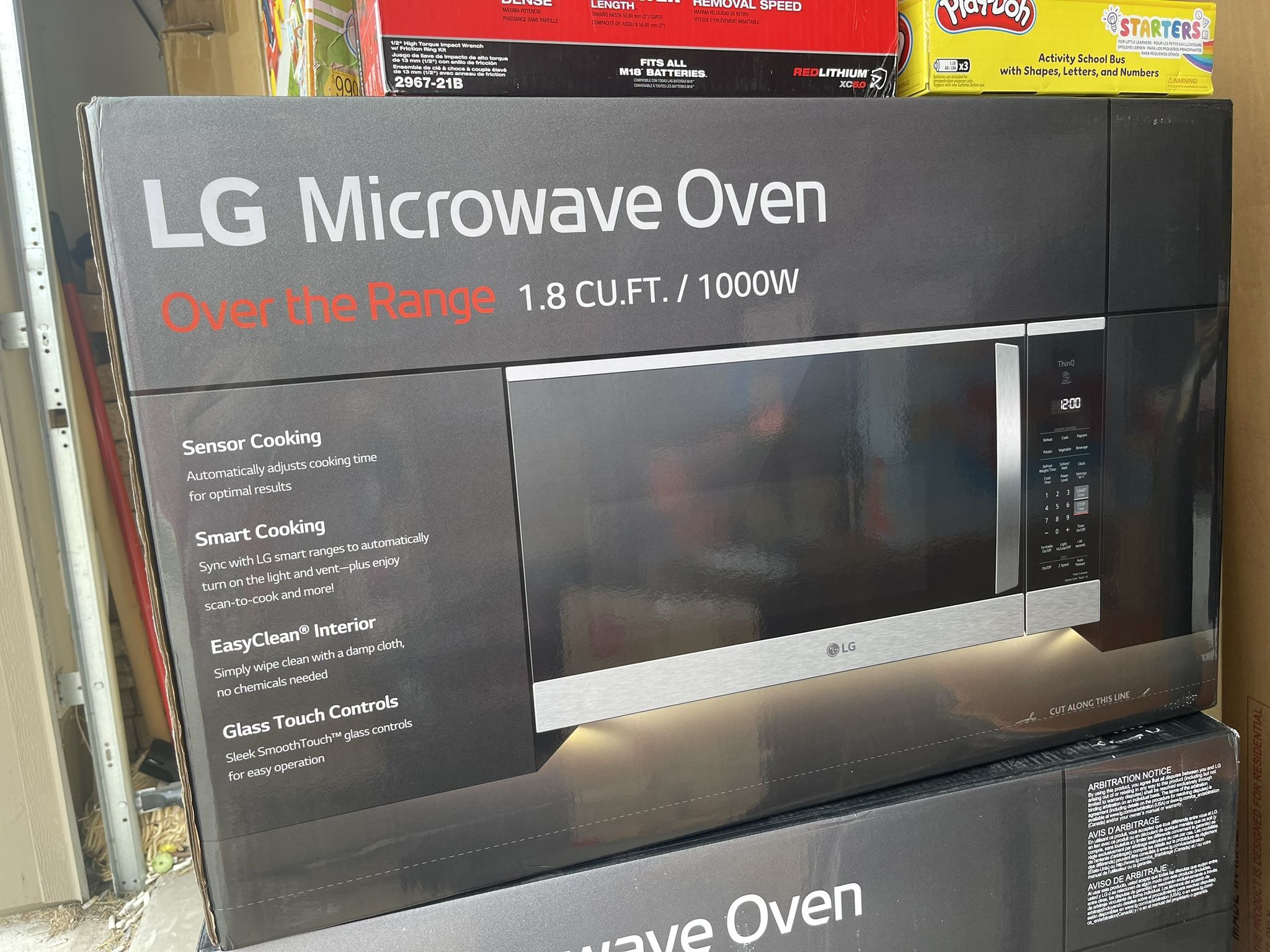 Lg 1.8 cu ft 1000 watt 29.88 in over the range microwave oven with sensor cooking