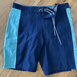 Hurley navy blue board shorts with adjustable waist and pockets. Size: 32"