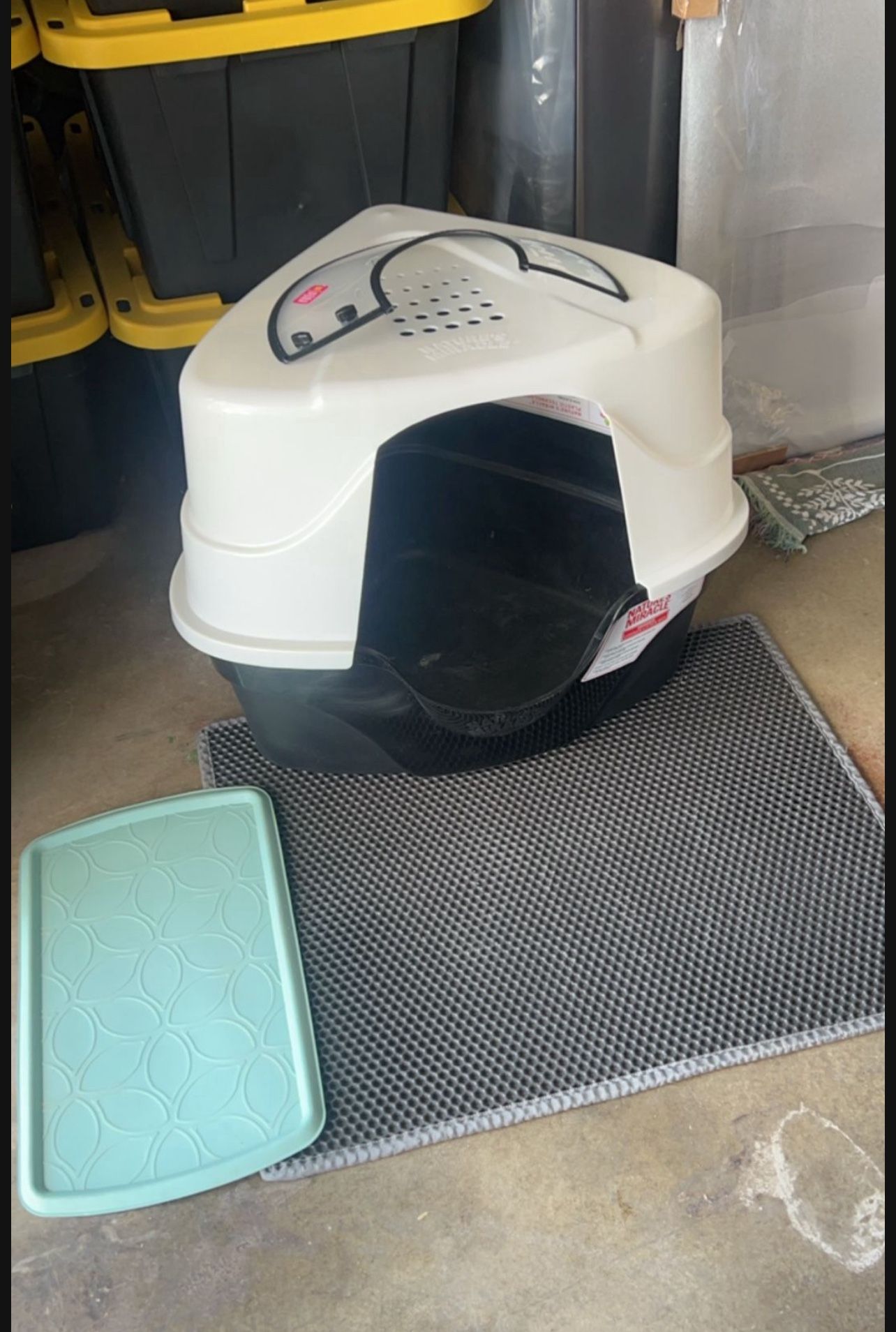 Cat Box And Green Cat Food Mat Available 