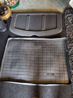 2013 kia Forte hatchback cargo cover with weathertech cargo floor protection.