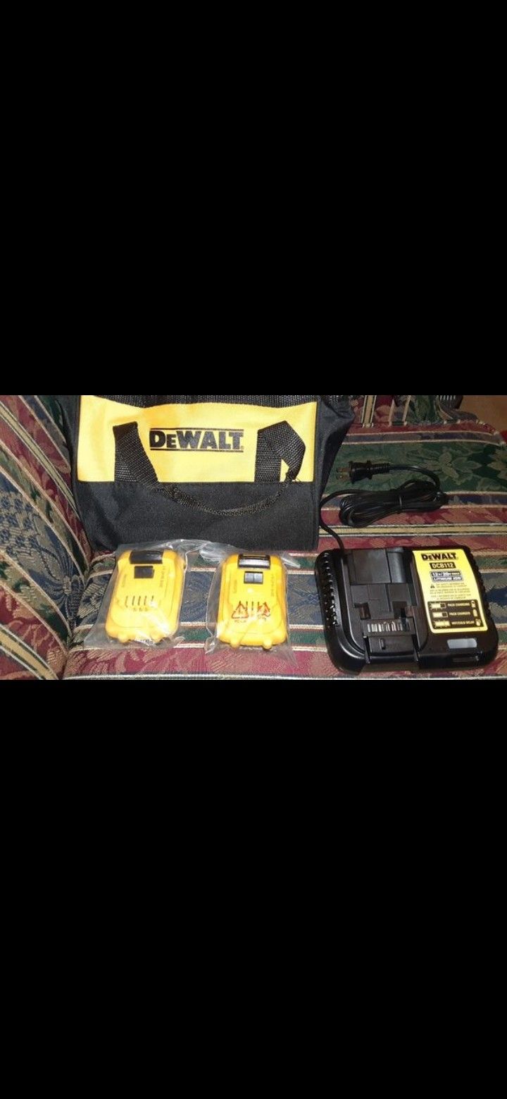 2 Dewalt 12 volt batteries and charger