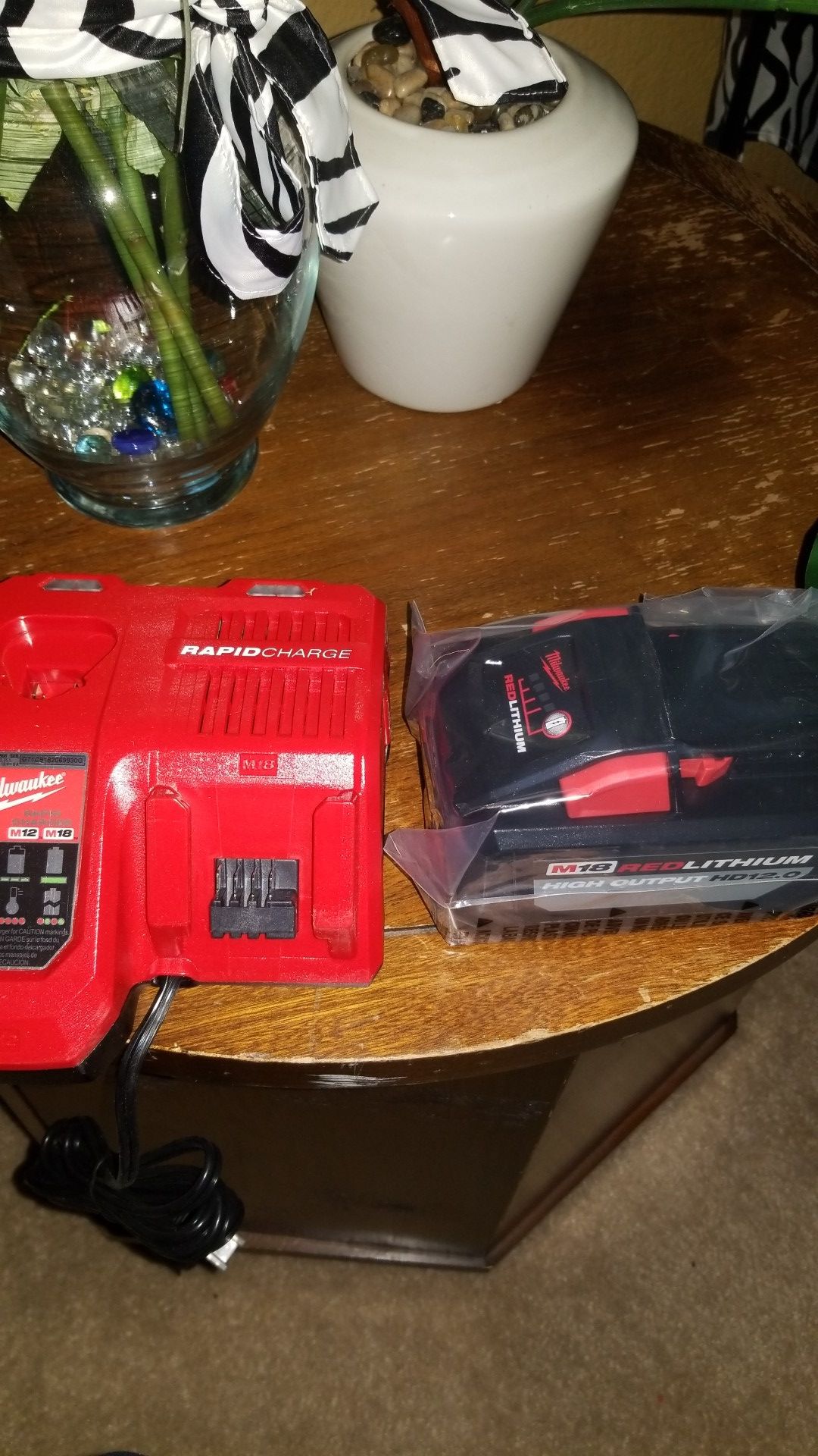 Milwaukee m18 12.0 battery with rapid charger $180 firm/ no menos