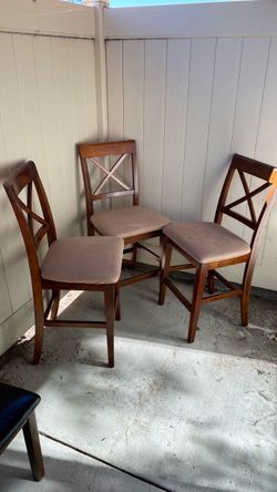 3 wooden dinning chairs