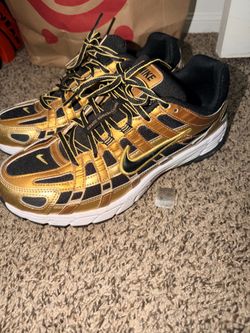 Nike P6000 black and gold