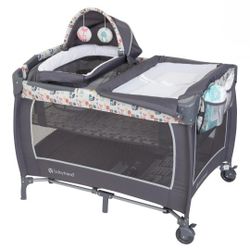 Lil’ Snooze® Deluxe II Nursery Center Playard
Portable Baby Playard with Changing Table