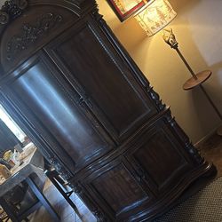 Brown Ornate  armoire part of  bedroom  set