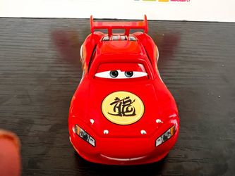 DISNEY PIXAR DRAGON  TOON MCQUEEN DIECAST CAR 1:55