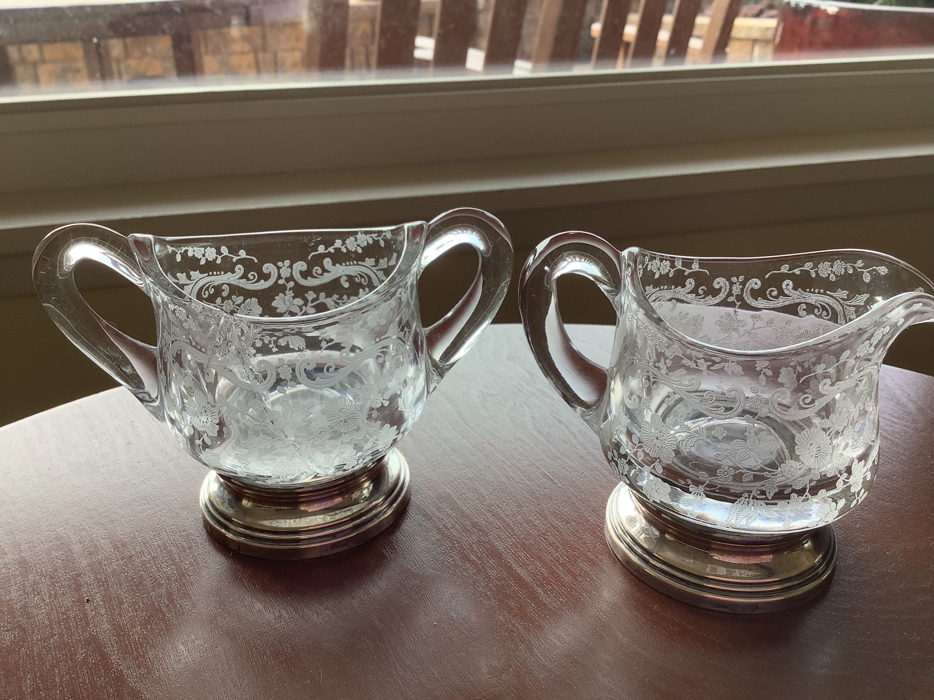 Vintage / Antique 1930’s Cambridge Glass Co. etched glass sugar and creamer set with sterling foot. 