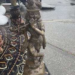 Brass Lord Krishna playing the flute