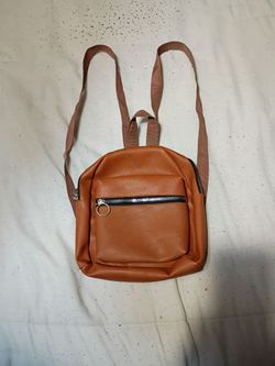 Tan Mini Backpack.