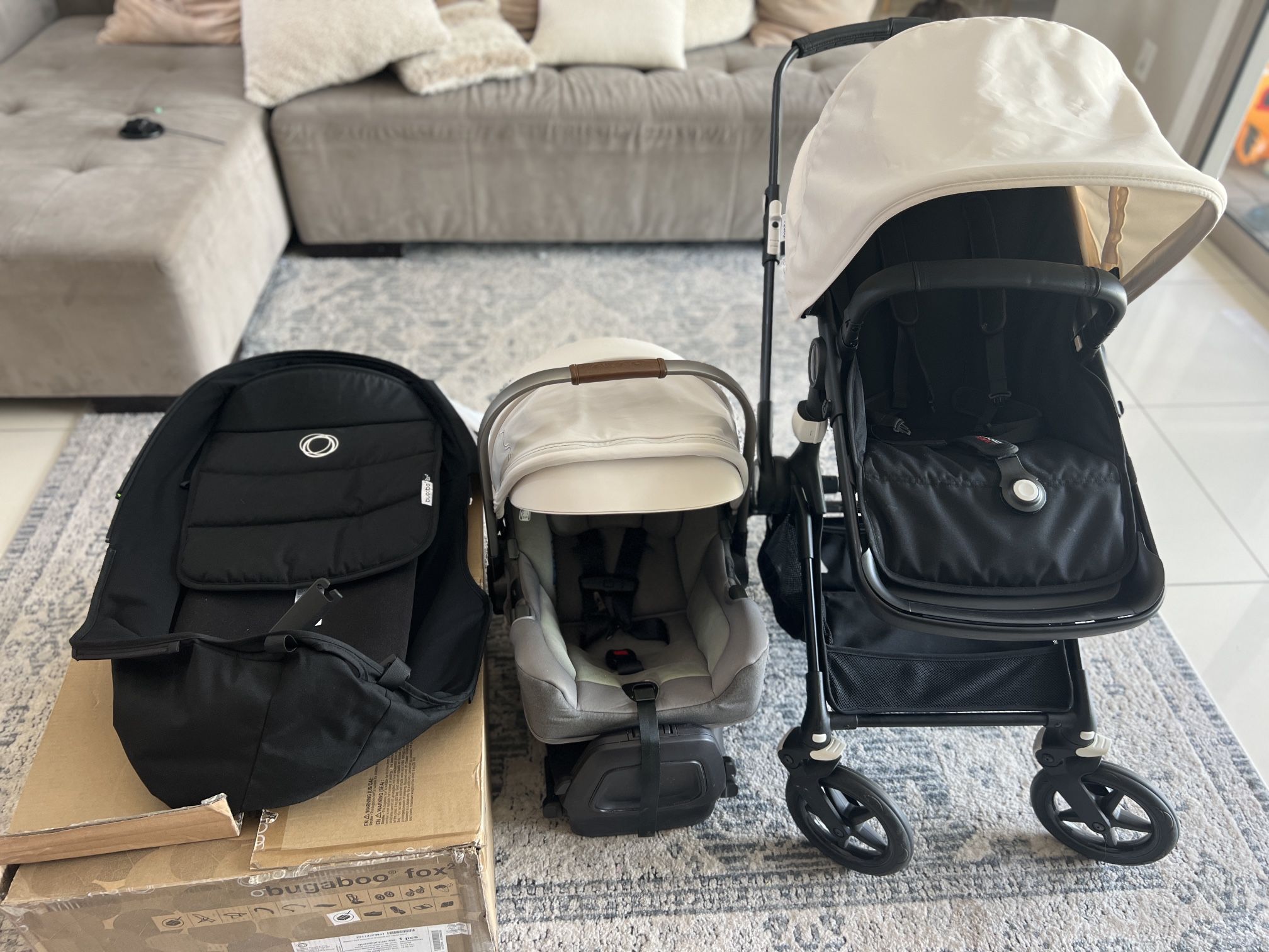 Complete Travel System - Nuna PIPA RX + RELX Base + Adapter For Bugaboo Fox2 Complete Stroller - Black Frame/White Canopy
