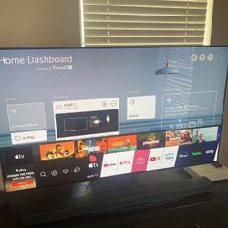 55in LG Smart OLED TV with Apple Tv, Wireless Subwoofer, And LG Soundbar 