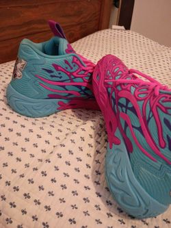Pink and blue lamelo basketball shoes