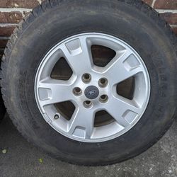 Set Of Ford Wheels On All Season Primewell Tires