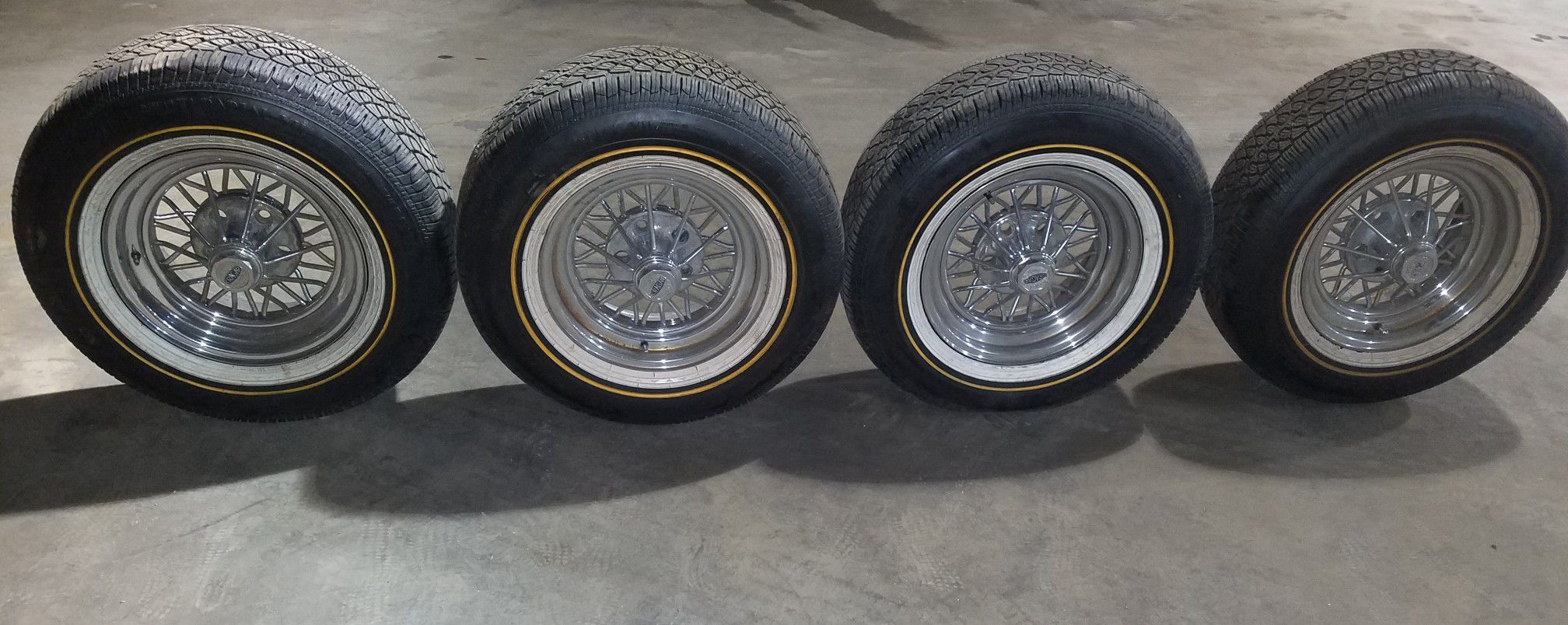 Cragar star wire rims with 235 70r15 Vogue tires