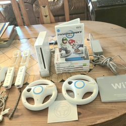 Nintendo Wii Mario Kart Bundle. Console, Super Mario, 7 Games, 2 Remotes, 2 Nunchuks, 2 Steering Wheels. Loaded