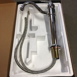 New in Box $25 chrome color single handle bathroom vessel faucet Ready