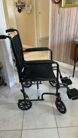 Transport wheelchair