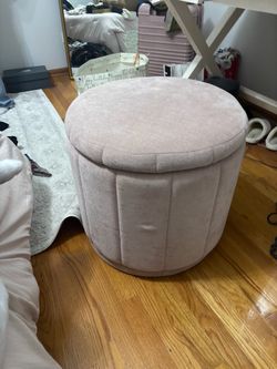 Pink ottoman with storage
